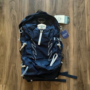 Osprey Blue Backpack with Reflective Accents and Compression Straps